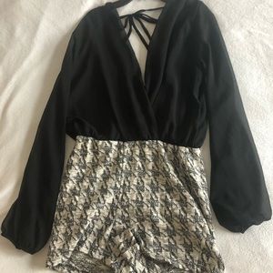 One piece short jumpsuit.